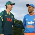 “Australia vs India 4th T20I 2025 – Players warming up at Carrara Stadium, Gold Coast under lights.”