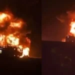 Burnt bus remains on a desert highway near Medina after the Saudi Bus Accident involving Indian Umrah pilgrims.