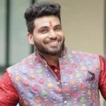 Shiv Thakare smiling during a reality TV appearance in 2026.