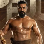 Ram Charan as a fierce rustic athlete in a promotional still from the movie Peddi.